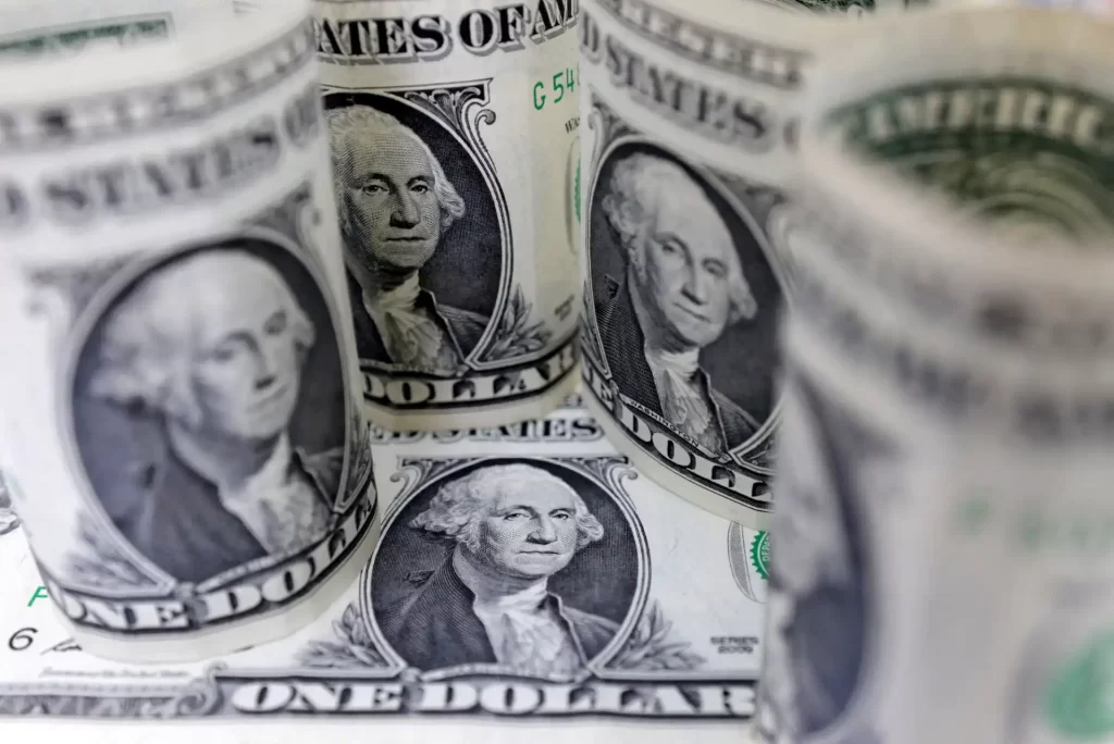 Imagem de vários dólares americanos Microsoft como símbolo de riqueza, dinheiro e finanças.